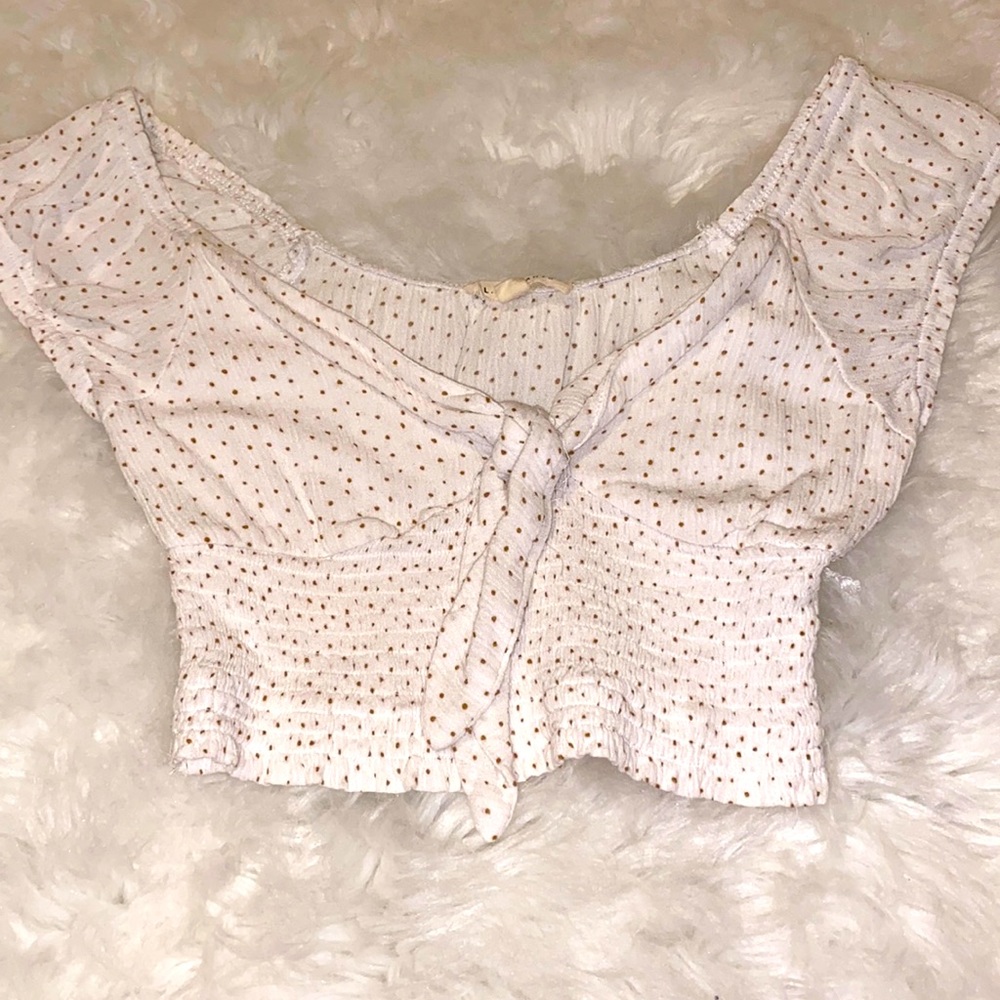 White and tan polka dotted cropped